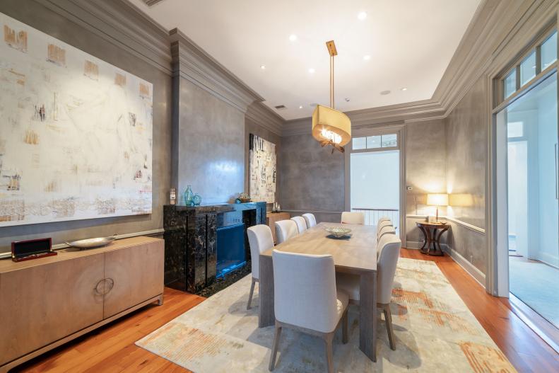 Gray Dining Room With Black Fireplace