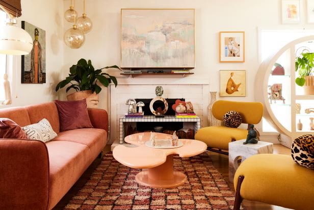 Pastel living room with propeller coffee table and checkerboard rug.