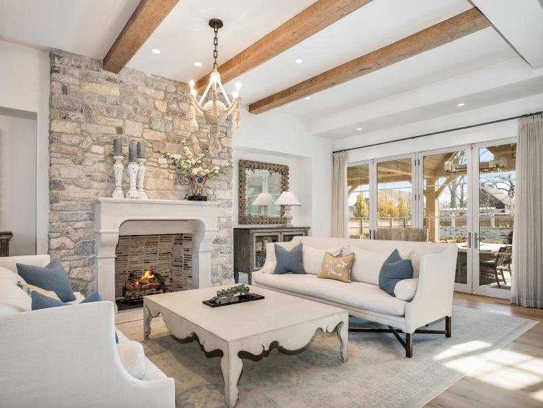 Traditional White Living Room With Stone Fireplace