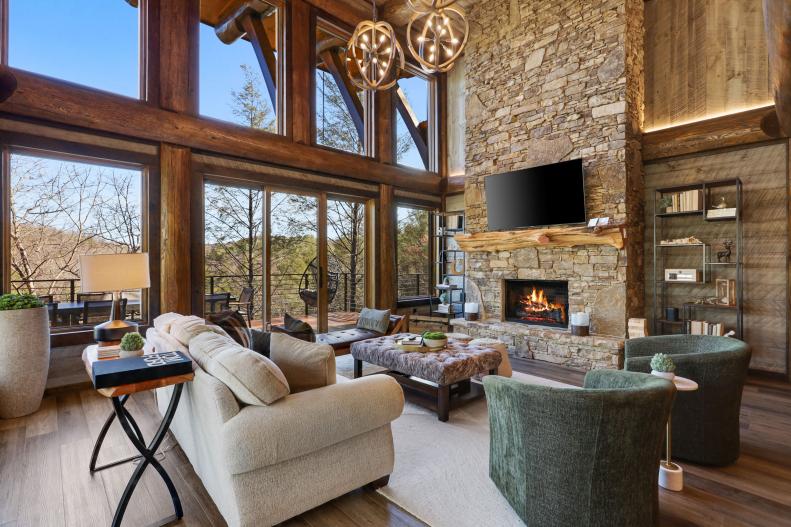 Stone Fireplace, Floor-to-Ceiling Windows, Comfy Living Room Furniture