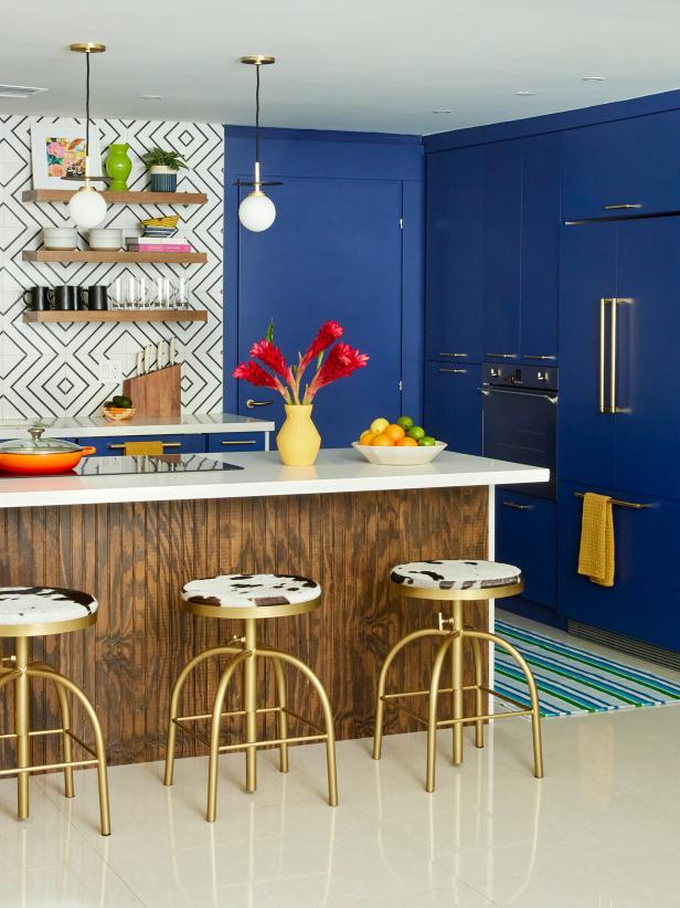 Bold Blue Kitchen With Patterned Backsplash Tiles