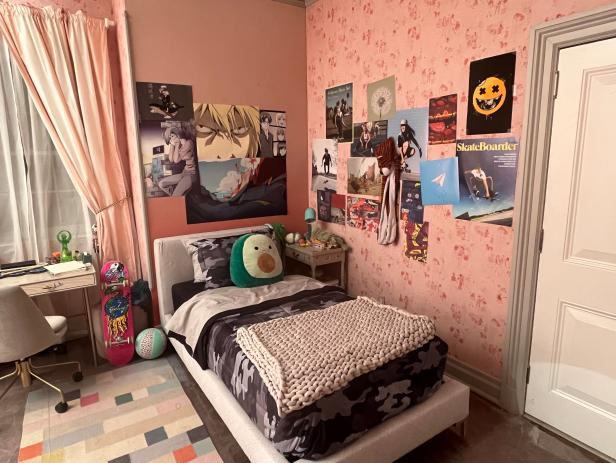 Pink bedroom with anime and skateboarding posters, and plush avocado.