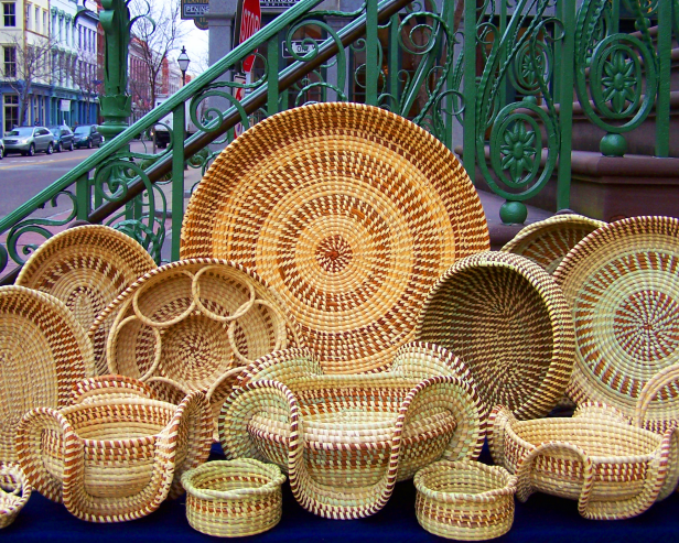 Corey Alston, of Charleston, South Carolina, is a Gullah sweetgrass basketmaker who designs sweetgrass baskets, trays, and Palmetto roses that are perfect for home decorations.
