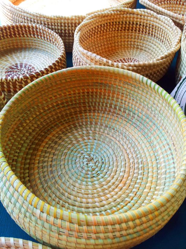 Corey Alston, of Charleston, South Carolina, is a Gullah sweetgrass basketmaker who designs sweetgrass baskets, trays, and Palmetto roses that are perfect for home decorations.