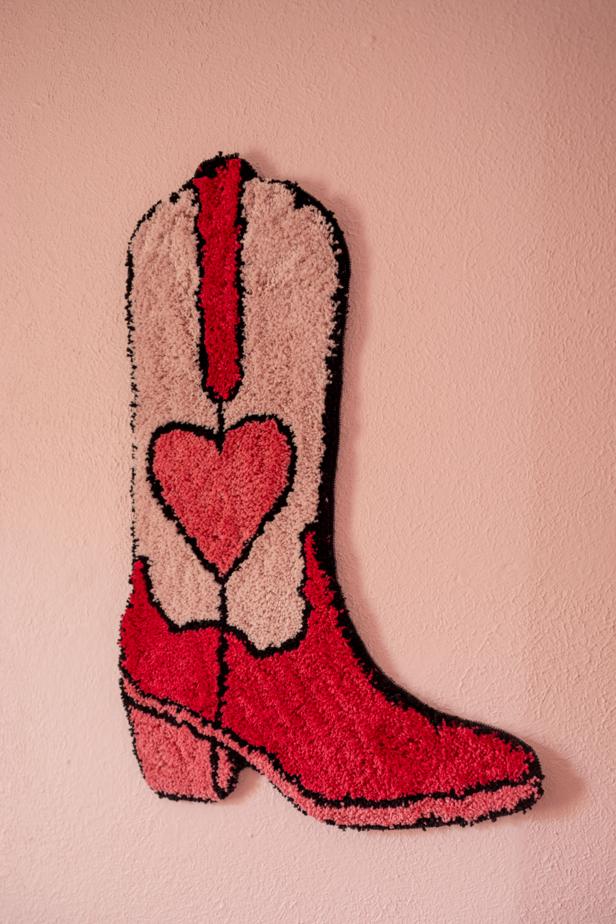 Carpet Shaped Like a Boot Hanging on Wall