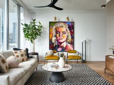 A Modern Condo Living Room With a Vibrant Painting