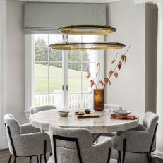Breakfast Nook With Gray Boucle Dining Chairs 