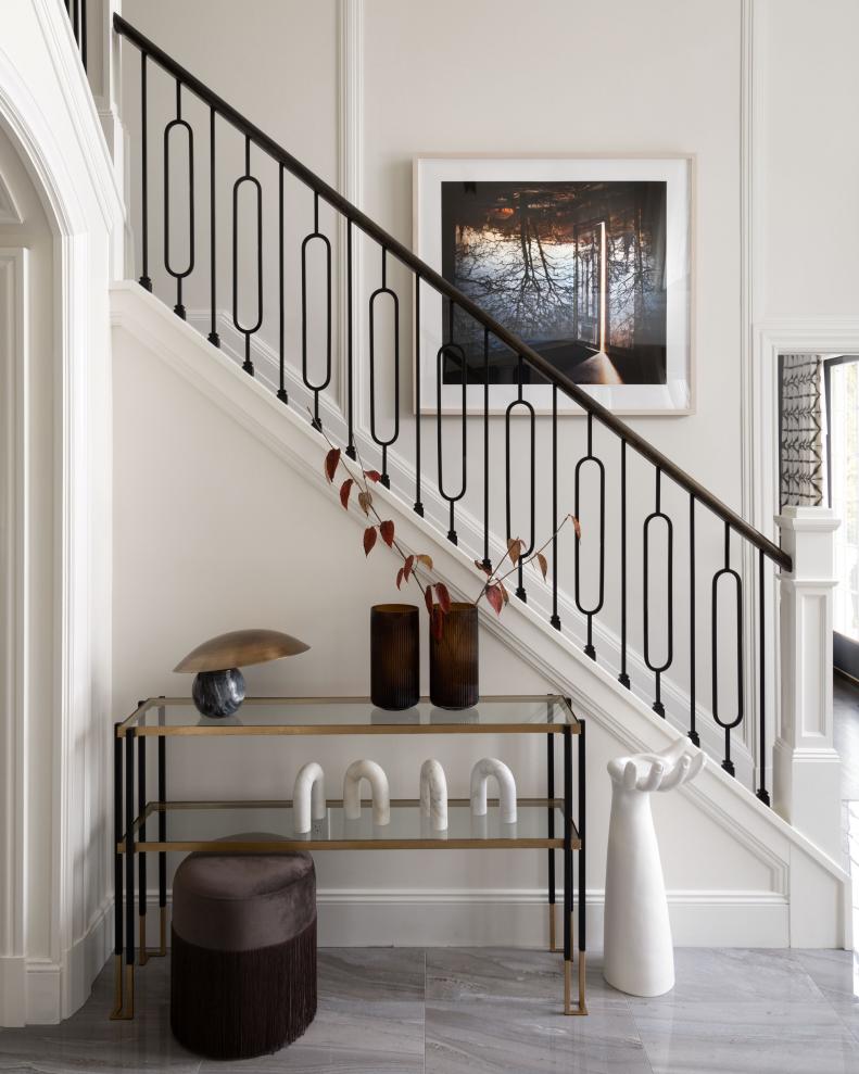 Entryway With Stairwell and Console Table