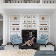 Transitional Living Room With White Built-in Shelves 