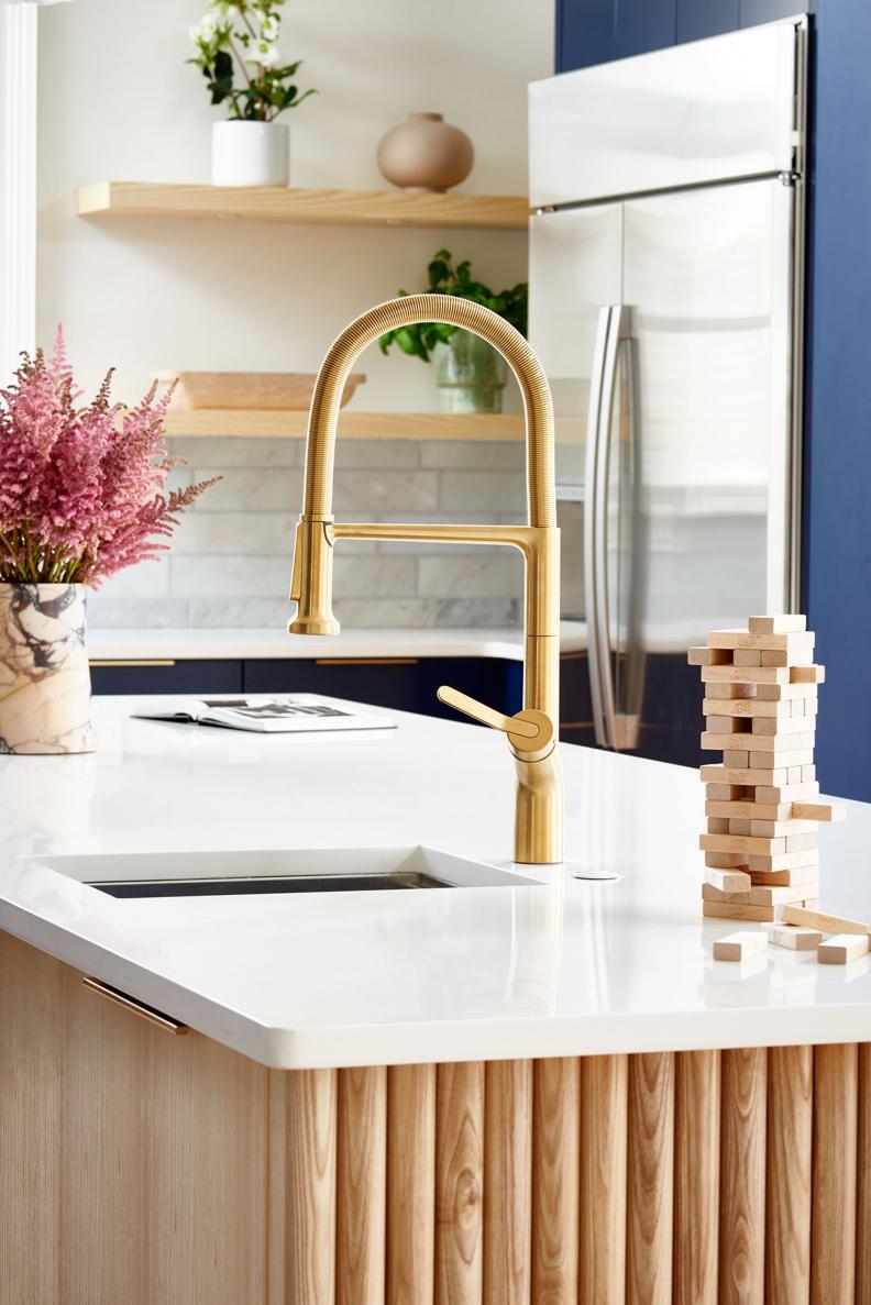 Kitchen Island and Brass Faucet