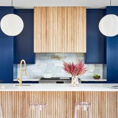 Contemporary Blue Kitchen With Fluted Wood