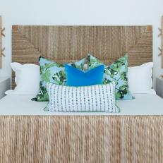 Neutral Coastal Bedroom With Blue Pillows