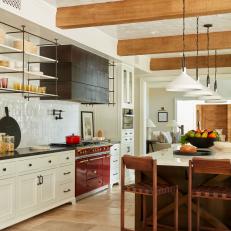Neutral Contemporary Chef Kitchen With Red Range