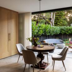 Open Concept Dining Space With Access to Outdoor Patio