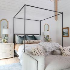 White Transitional Bedroom With Black Canopy Bed