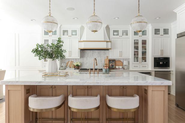 Transitional White Kitchen With Light Blue Cabinets and Brass Accents, 2023