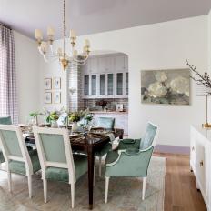 Classic Pastel Dining Room With Green Velvet Chairs