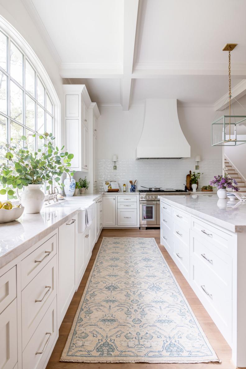 Marble Countertops and Subway Tile Backsplash in Kitchen