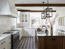 Neutral Transitional Chef Kitchen With Black Floor