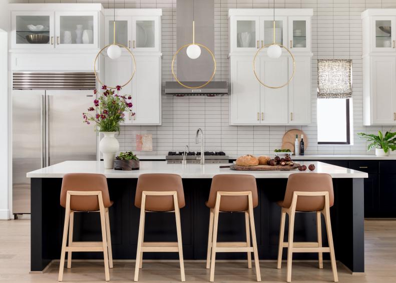 Kitchen With Large Island and Four Barstools