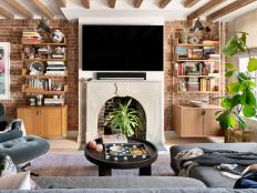 Eclectic Living Room With Stone Fireplace