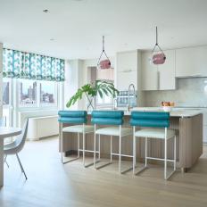 Modern Kitchen With Blue Upholstered Barstools
