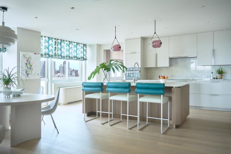 Kitchen With Island and Three Bar Stools
