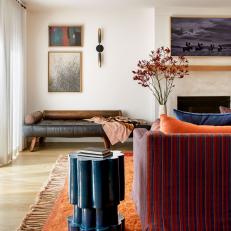 Living Room with Shades of Orange, Red and Navy 