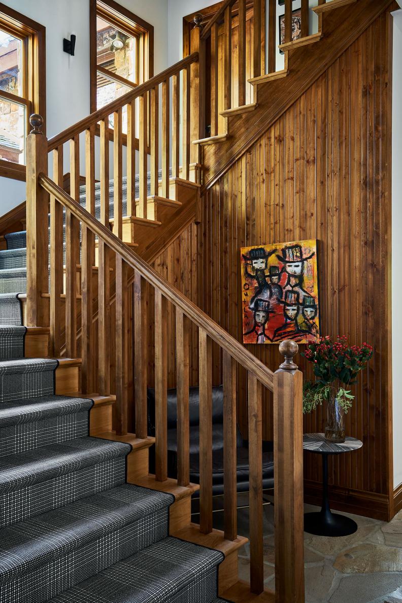 Wood Paneled Stairsl With Runner