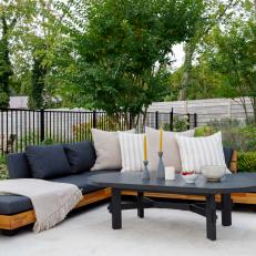 Blue Outdoor Sectional With Woven Lanterns