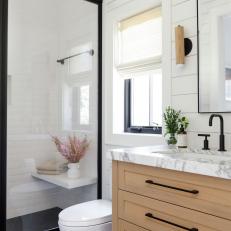 White Contemporary Bathroom With Black Tile Floor