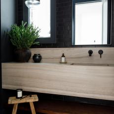 Black Bathroom With Rustic Wood Stool