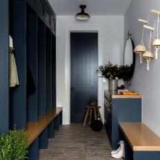 Contemporary Blue Mudroom With White Boots