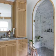 Neutral Spa Bathroom With Arched Shower