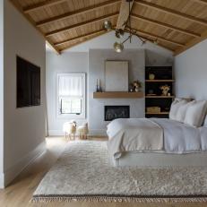 Neutral Contemporary Bedroom With Wood Ceiling