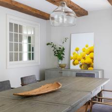 Gray Transitional Dining Room With Exposed Beams