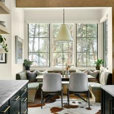 Cowhide Rug Adds Personality to Banquette Breakfast Nook