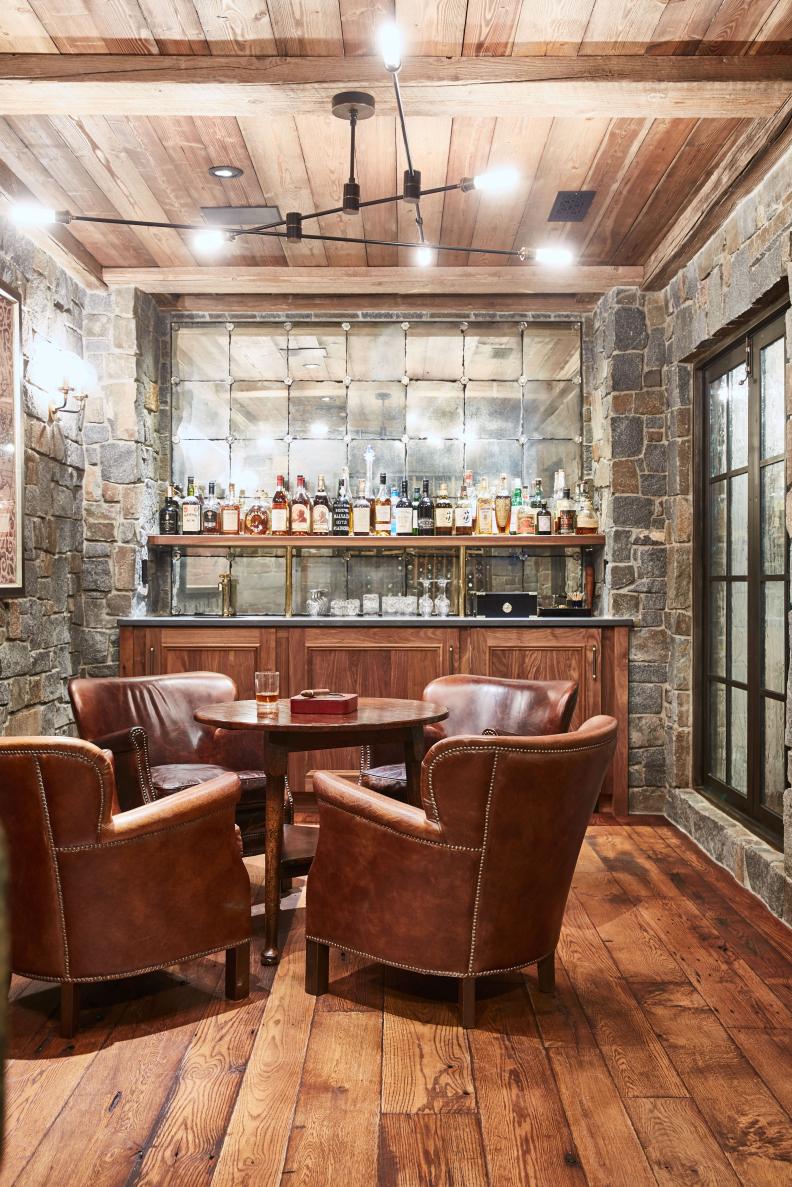 Four Leather Club Chairs at Small Round Wood Table in Private Bar