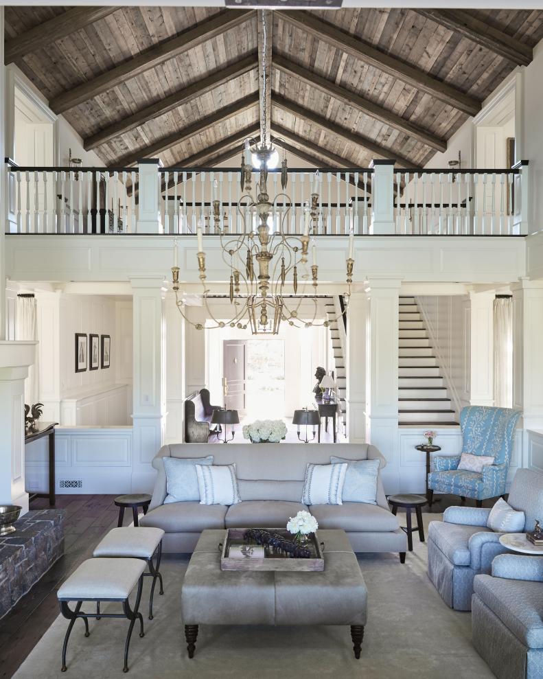 Neutral Traditional Living Room With Large Chandelier