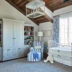 Spacious Neutral Transitional Baby Nursery With Blue Accents