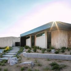 Contemporary Concrete-and-Stone House With Desert-Friendly Landscaping