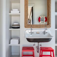 White Nautical-Themed Bathroom With Built-In Storage