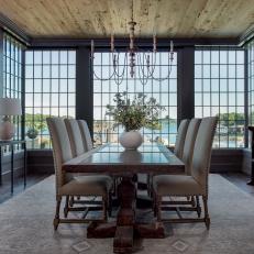 Neutral Transitional Dining Room With Waterfront View