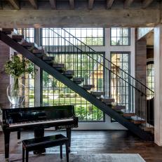 Metal-and-Wood Staircase Next to Black-Framed Windows