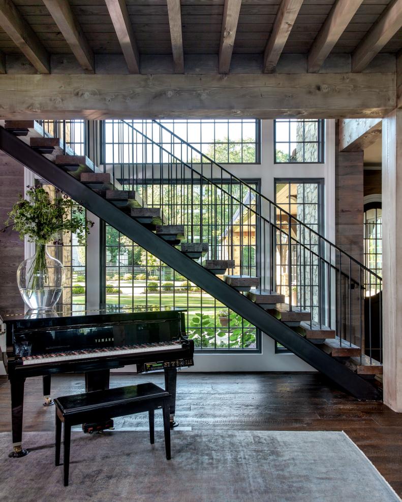 Grand Piano in Nook Underneath Metal-and-Wood Staircase
