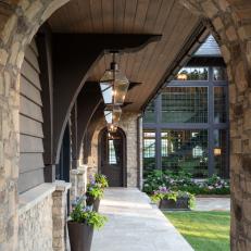 Covered Exterior Transitional Walkway Features Neutral, Natural Materials