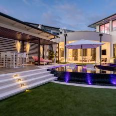 Luxe Backyard With a Pool and Cabana