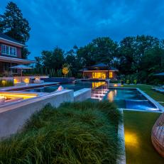 Backyard at Night With Split Level Pool