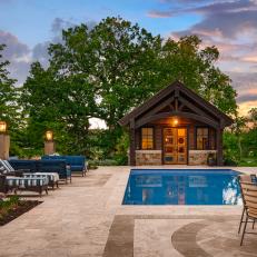 Scenic Backyard With a Cabin Style Pool house