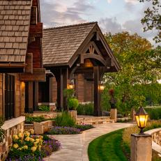 Cabin Exterior With Colorful Landscaping